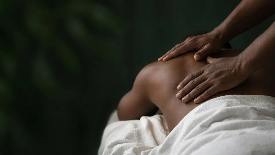 Illustrative close-up of professional shoulder massage